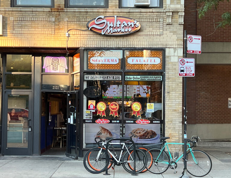 A close view of Sultan's Market Lincoln Park storefront.