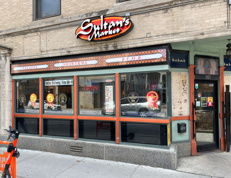A close view of Sultan's Market Wicker Park storefront.