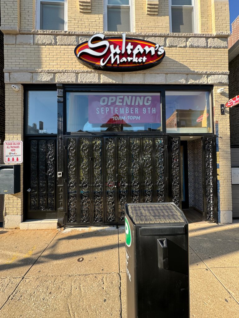 A close view of Sultan's Market Pilsen's storefront